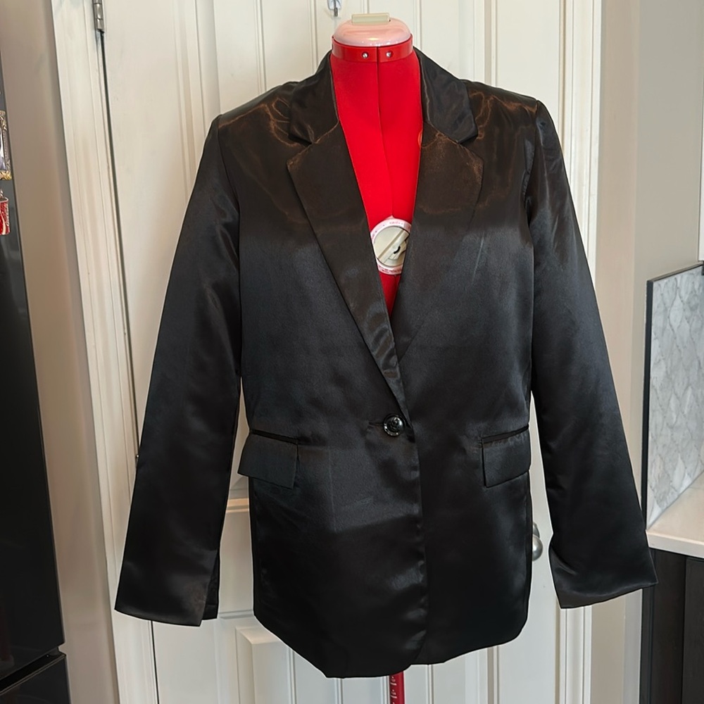 And now this shiny black blazer